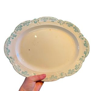 Vintage platter green and white markings with small crack